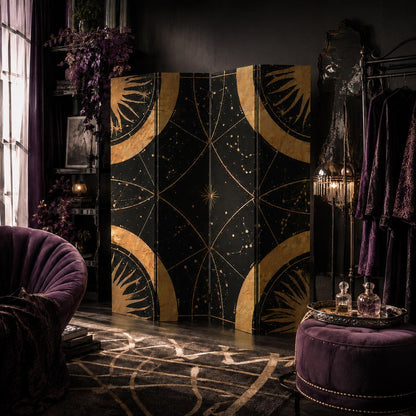 May include: A four-panel folding room divider featuring a black background with gold celestial motifs, including sun rays, stars, and constellations. The panels are connected by hinges and stand upright, displaying a continuous graphic design.