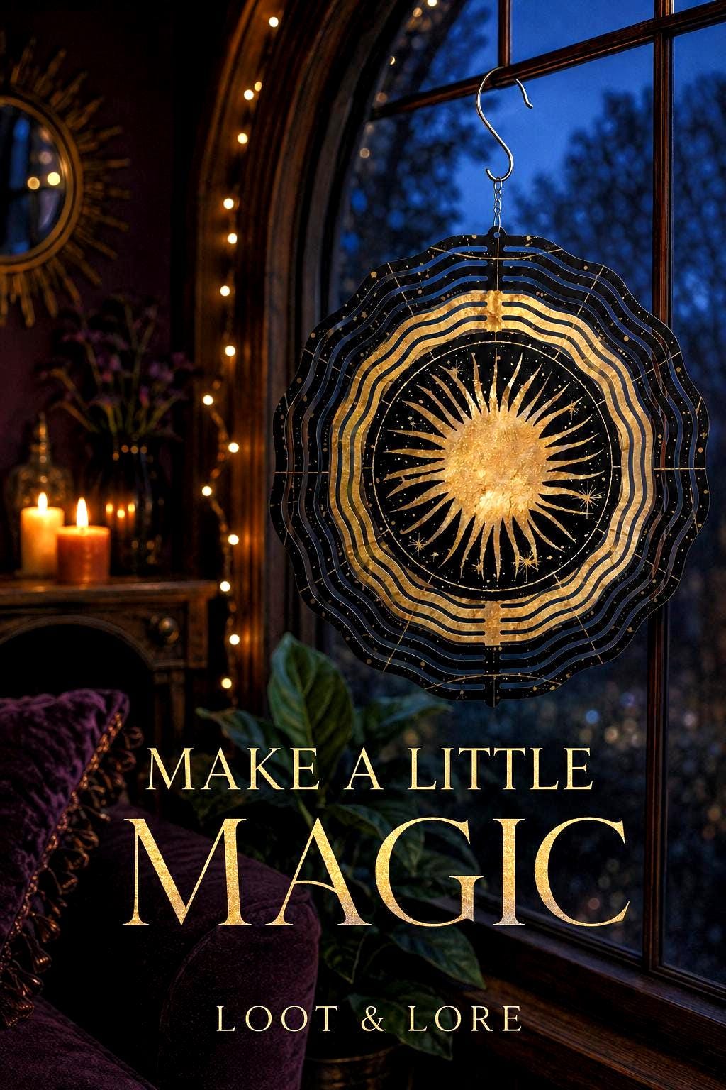 May include: A circular black and gold wind spinner featuring a central sun design with radiating rays and concentric wavy patterns. The object hangs from a silver metal hook. The text "MAKE A LITTLE MAGIC" and "LOOT &amp; LORE" is visible.