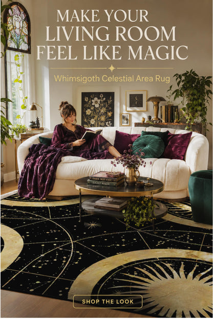 May include: A black area rug featuring a gold celestial pattern with sun, moon, and star motifs. The rug has a circular design with radiating lines and constellations printed across the surface, covering the floor in front of a white sofa.