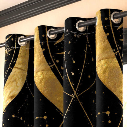 May include: A black curtain panel featuring a gold celestial pattern with stars and geometric lines. The fabric is suspended from a dark metal rod by silver-toned circular grommets, creating deep vertical folds across the patterned material.
