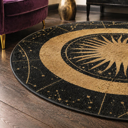 May include: A circular area rug featuring a black and gold celestial design. The center displays a radiant sun motif surrounded by concentric rings. The outer border is divided into segments containing gold constellations against a black background.