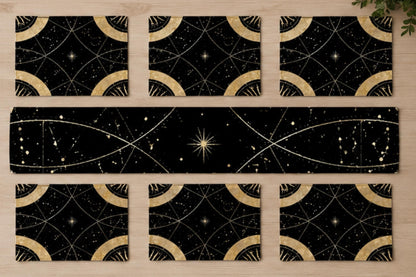 May include: A set of six rectangular placemats and one long rectangular table runner, all featuring a black background with a gold celestial pattern of stars, constellations, and curved lines forming circular geometric shapes across the surface.