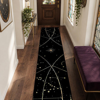 May include: A long, rectangular runner rug featuring a black background with a white celestial pattern of intersecting curved lines, scattered stars, and constellations. The design includes a central starburst motif and various star clusters.